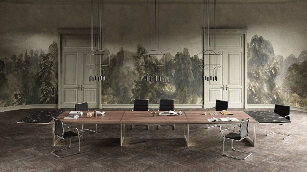 conference room table defining a hybrid space for formal meetings and collaborative teamwork.